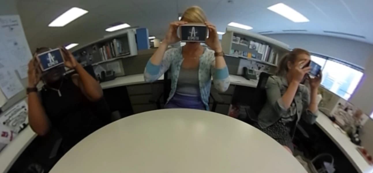 People testing the Azimuth career exploration experience using smartphone virtual reality viewers